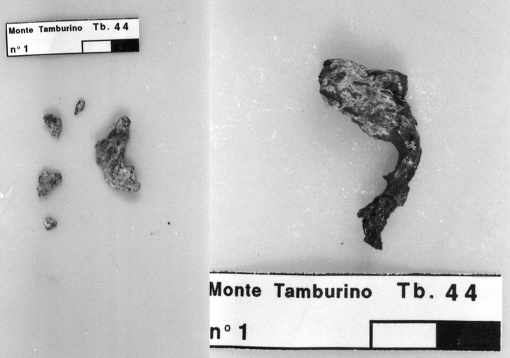 frammento di fibula in ferro prima e dopo il restauro